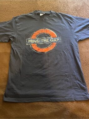 Underground Navy Blue 'Mind The Gap' Graphic Tee with Orange Emblem